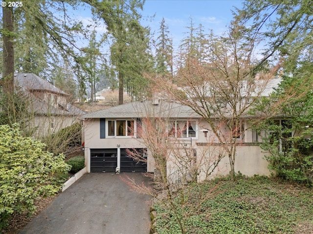 view of front of property with a garage