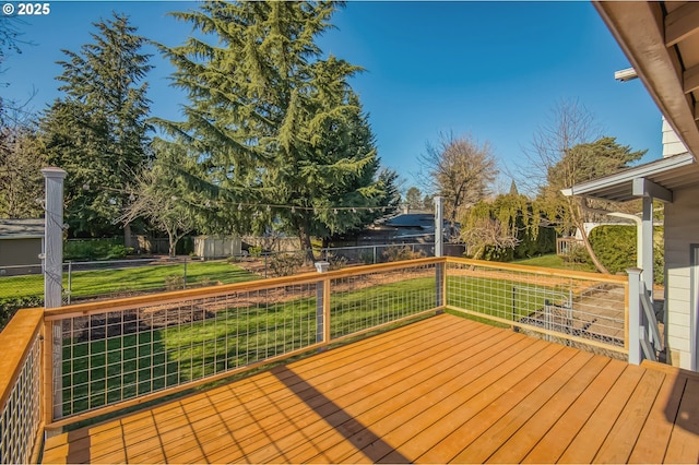 deck featuring a lawn