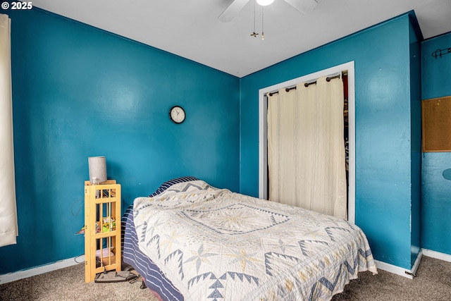 bedroom with ceiling fan and carpet