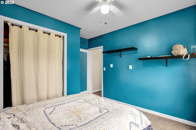 bedroom featuring ceiling fan and carpet