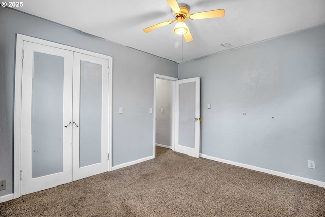 unfurnished bedroom with carpet floors, a closet, and ceiling fan