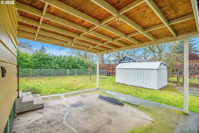 view of patio / terrace with a storage shed