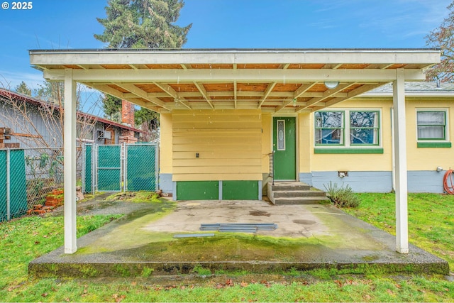 exterior space featuring a carport