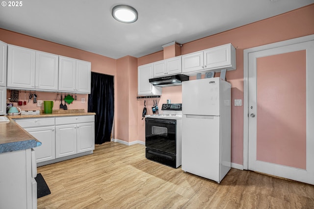 kitchen with range with electric stovetop, light wood-type flooring, white cabinets, and white refrigerator