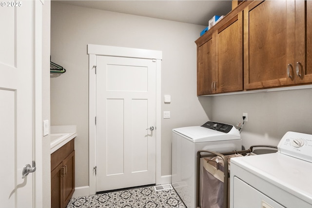 3466 N Holladay St, Cornelius, OR 97124 - washroom featuring washer and clothes dryer and cabinet space