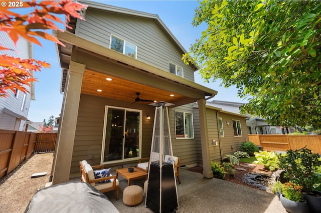 3466 N Holladay St, Cornelius, OR 97124 - rear view of property featuring a ceiling fan, a fenced backyard, a patio area, and an outdoor hangout area