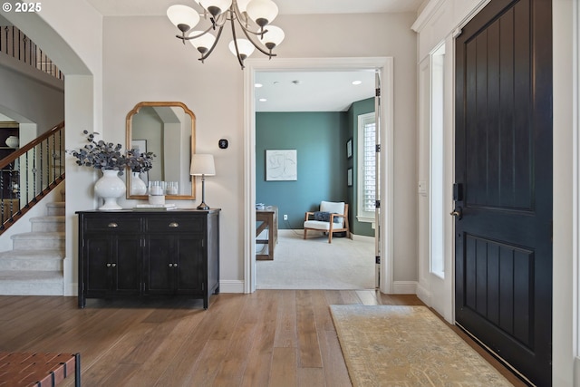 3534 NW Maple St, Camas, WA 98607 - entryway featuring a chandelier, light wood-style flooring, stairs, baseboards, and recessed lighting