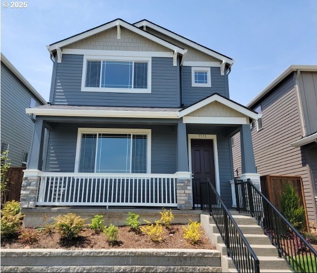 7773 NW Eleanor Ave, Portland, OR 97229 - craftsman inspired home featuring covered porch and stone siding
