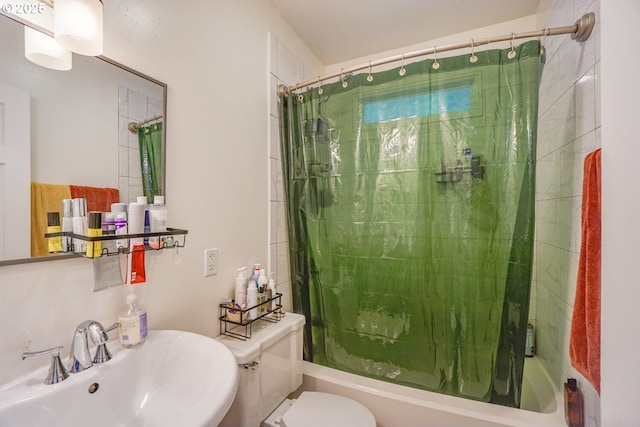 full bathroom featuring sink, toilet, and shower / bath combo