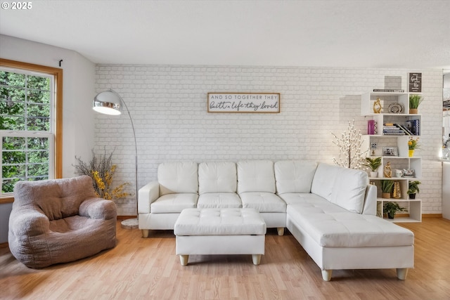 16111 NW Paisley Dr, Beaverton, OR 97006 - living room with brick wall and wood finished floors