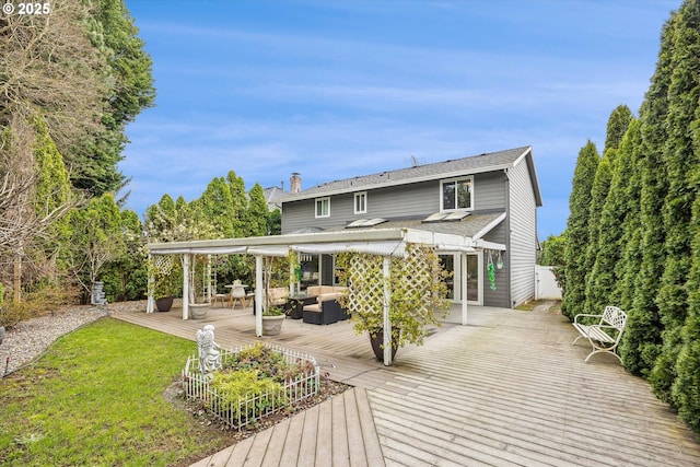 16111 NW Paisley Dr, Beaverton, OR 97006 - back of house featuring an outdoor living space, a wooden deck, a chimney, and a lawn