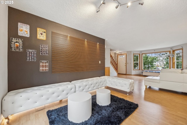 16111 NW Paisley Dr, Beaverton, OR 97006 - bedroom featuring wood finished floors and a textured ceiling