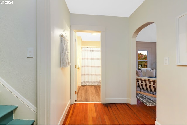 hallway featuring hardwood / wood-style flooring