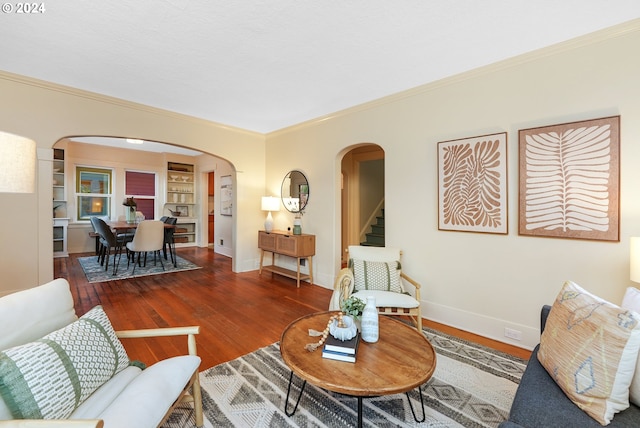 living room featuring crown molding and dark hardwood / wood-style flooring