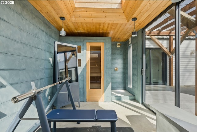 interior space featuring tile patterned floors and wood walls