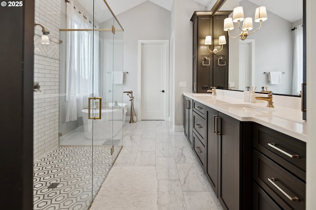 14014 NW 57th Ave, Vancouver, WA 98685 - bathroom featuring a stall shower, vaulted ceiling, a sink, a soaking tub, and marble finish floor