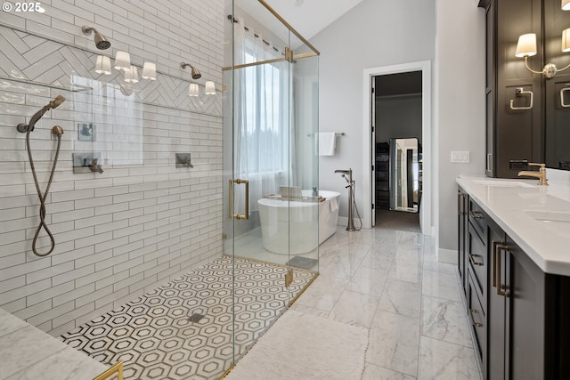 14014 NW 57th Ave, Vancouver, WA 98685 - bathroom featuring a shower stall, marble finish floor, a freestanding tub, and a sink