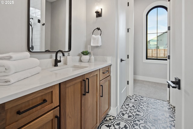 14014 NW 57th Ave, Vancouver, WA 98685 - bathroom featuring baseboards and vanity
