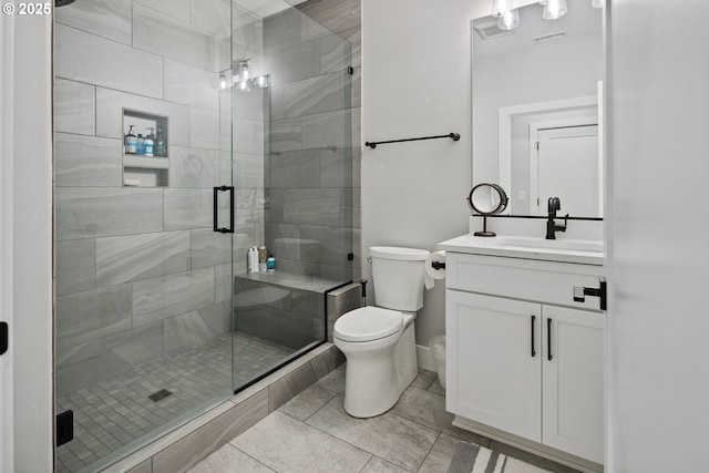 14014 NW 57th Ave, Vancouver, WA 98685 - full bath featuring a stall shower, baseboards, toilet, and vanity