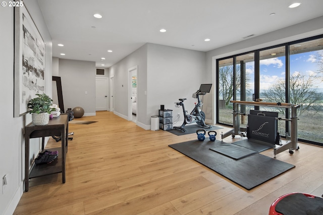 14014 NW 57th Ave, Vancouver, WA 98685 - exercise room with recessed lighting, baseboards, visible vents, and light wood-type flooring