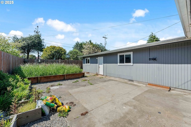 view of patio with fence
