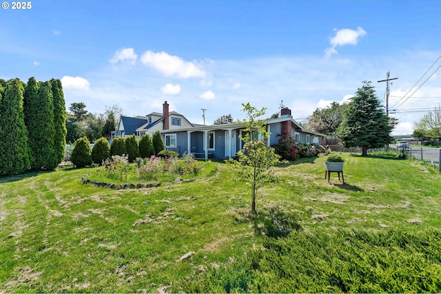 view of yard featuring fence