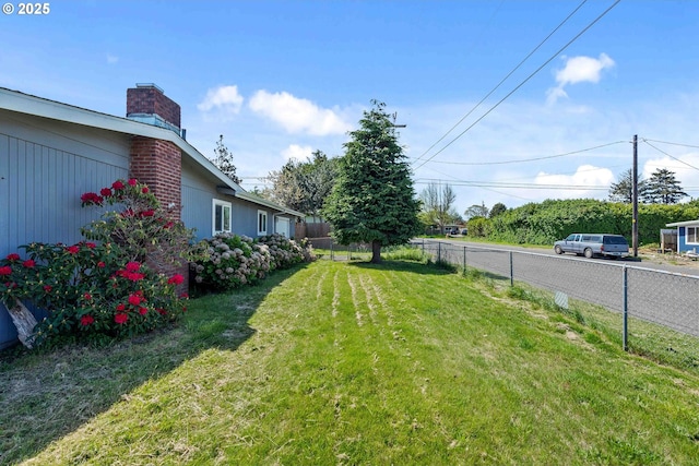 view of yard featuring fence