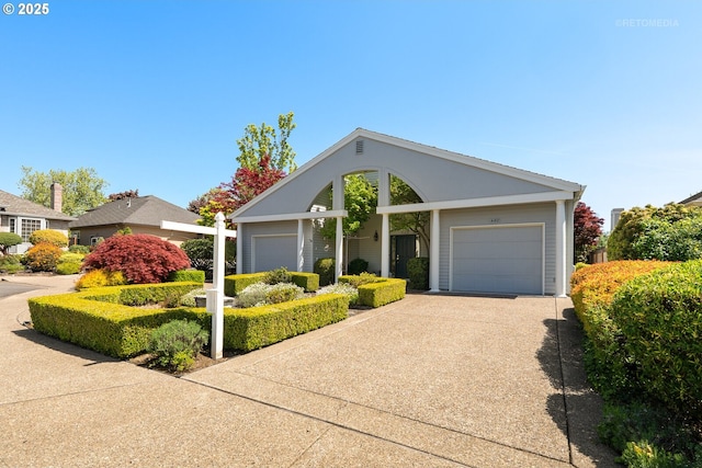 4182 NW Spoon Pl, Portland, OR 97229 - ranch-style home with an attached garage and concrete driveway