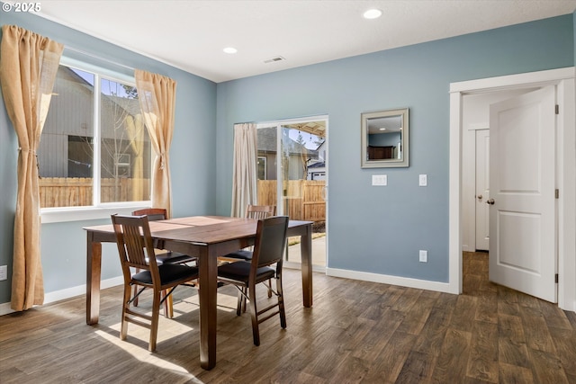 dining area featuring recessed lighting, dark wood-style floors, and baseboards