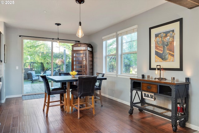 10449 SW Denmark St, Wilsonville, OR 97070 - dining room with baseboards and dark wood-style flooring