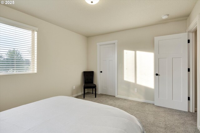 10449 SW Denmark St, Wilsonville, OR 97070 - carpeted bedroom featuring baseboards