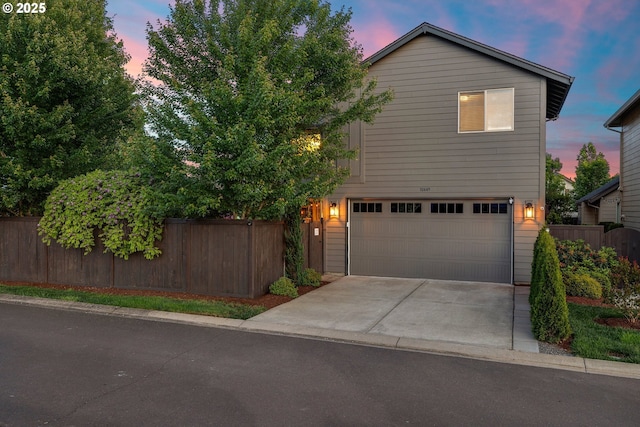 10449 SW Denmark St, Wilsonville, OR 97070 - view of front of property with an attached garage and driveway