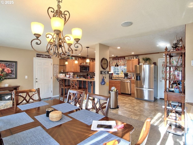 dining room featuring an inviting chandelier