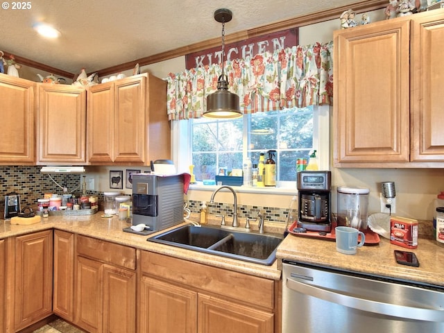 kitchen with hanging light fixtures, dishwasher, sink, and crown molding