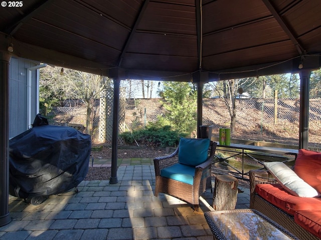 view of patio / terrace with a gazebo, a grill, and an outdoor hangout area