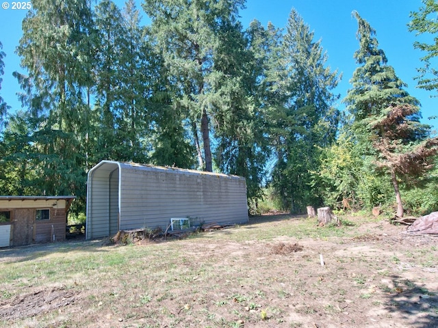 view of yard with a carport