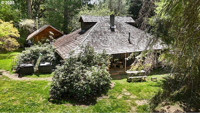 2128 Starveout Creek Rd, Azalea, OR 97410 - view of home's exterior featuring a lawn and a view of trees
