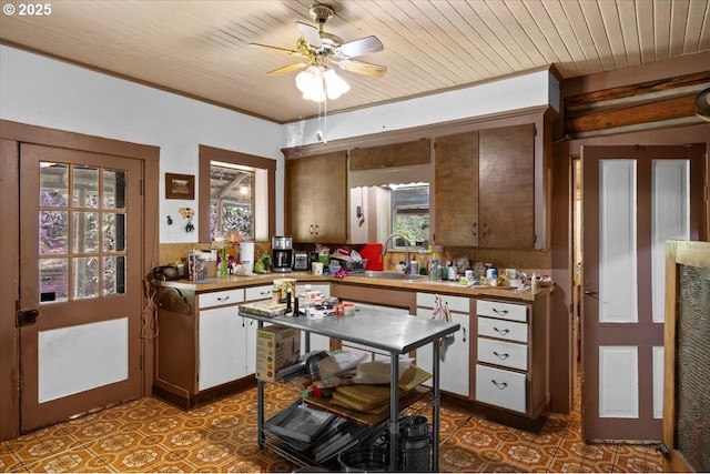 2128 Starveout Creek Rd, Azalea, OR 97410 - kitchen featuring a sink, ornamental molding, a ceiling fan, light countertops, and wooden ceiling