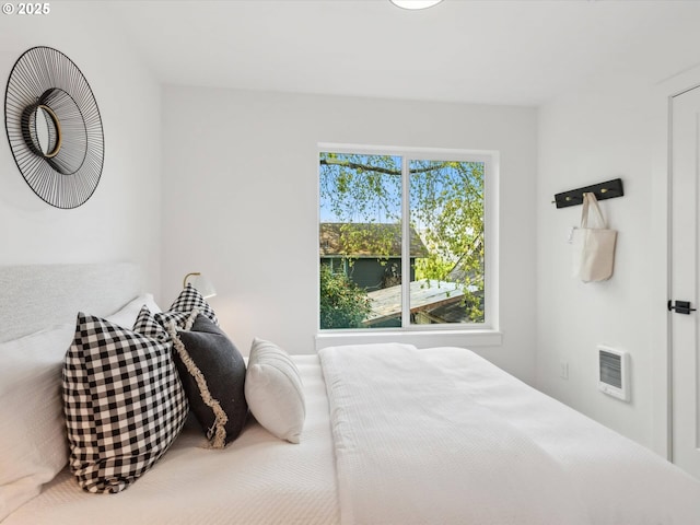 bedroom with heating unit