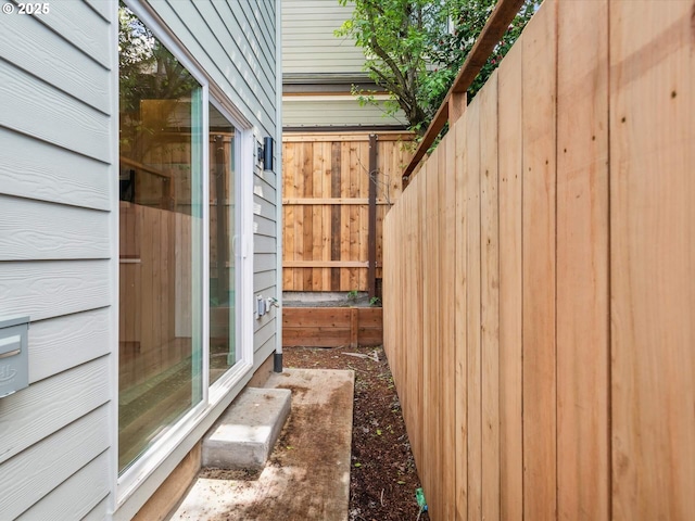 view of property exterior with fence