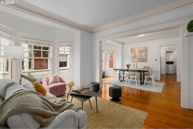 2083 NW Johnson St Unit 44, Portland, OR 97209 - living room featuring wood finished floors and ornamental molding