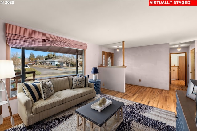 living room with hardwood / wood-style floors