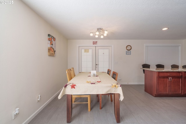 3584 NE Brogden St, Hillsboro, OR 97124 - dining room featuring baseboards, recessed lighting, and french doors