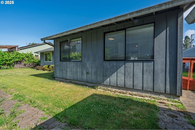 3584 NE Brogden St, Hillsboro, OR 97124 - view of property exterior with a lawn