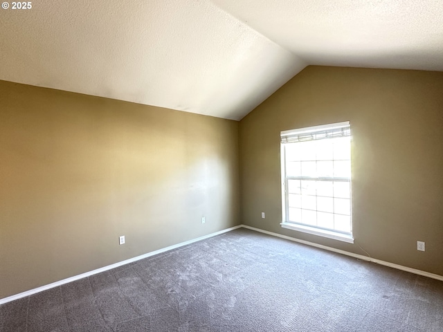 22000 SW Grahams Ferry Rd Unit C, Tualatin, OR 97062 - carpeted empty room with lofted ceiling, baseboards, and a textured ceiling