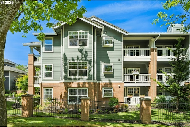 30326 SW Ruth St Unit 56, Wilsonville, OR 97070 - back of house featuring a balcony