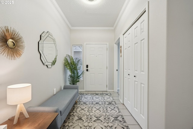 30326 SW Ruth St Unit 56, Wilsonville, OR 97070 - foyer entrance with crown molding and light tile patterned floors