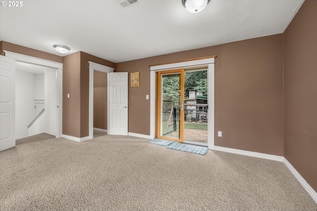 12712 SE 137th Dr, Happy Valley, OR 97086 - spare room featuring light carpet and baseboards