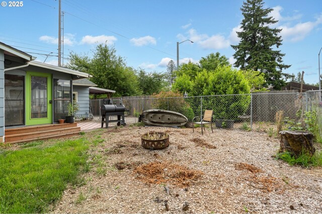 960 E Main St, Hillsboro, OR 97123 - fenced backyard featuring a fire pit and a deck