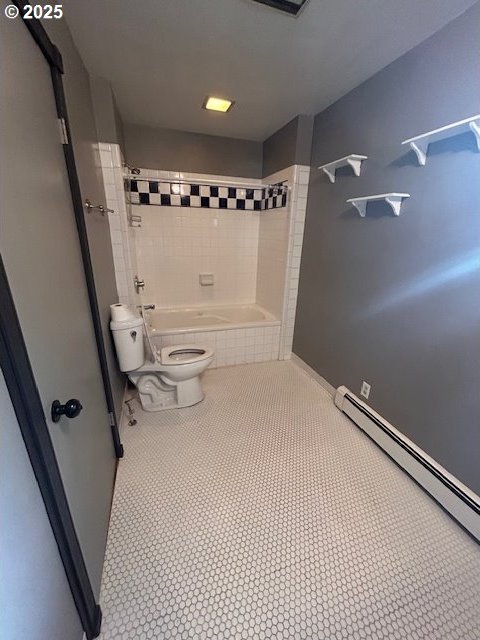 960 E Main St, Hillsboro, OR 97123 - full bathroom featuring baseboard heating, shower / tub combination, and tile patterned flooring